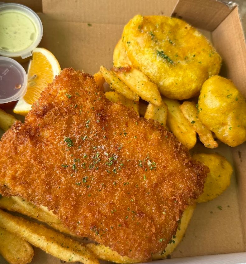 Crumbed snapper and battered fish bites with chips